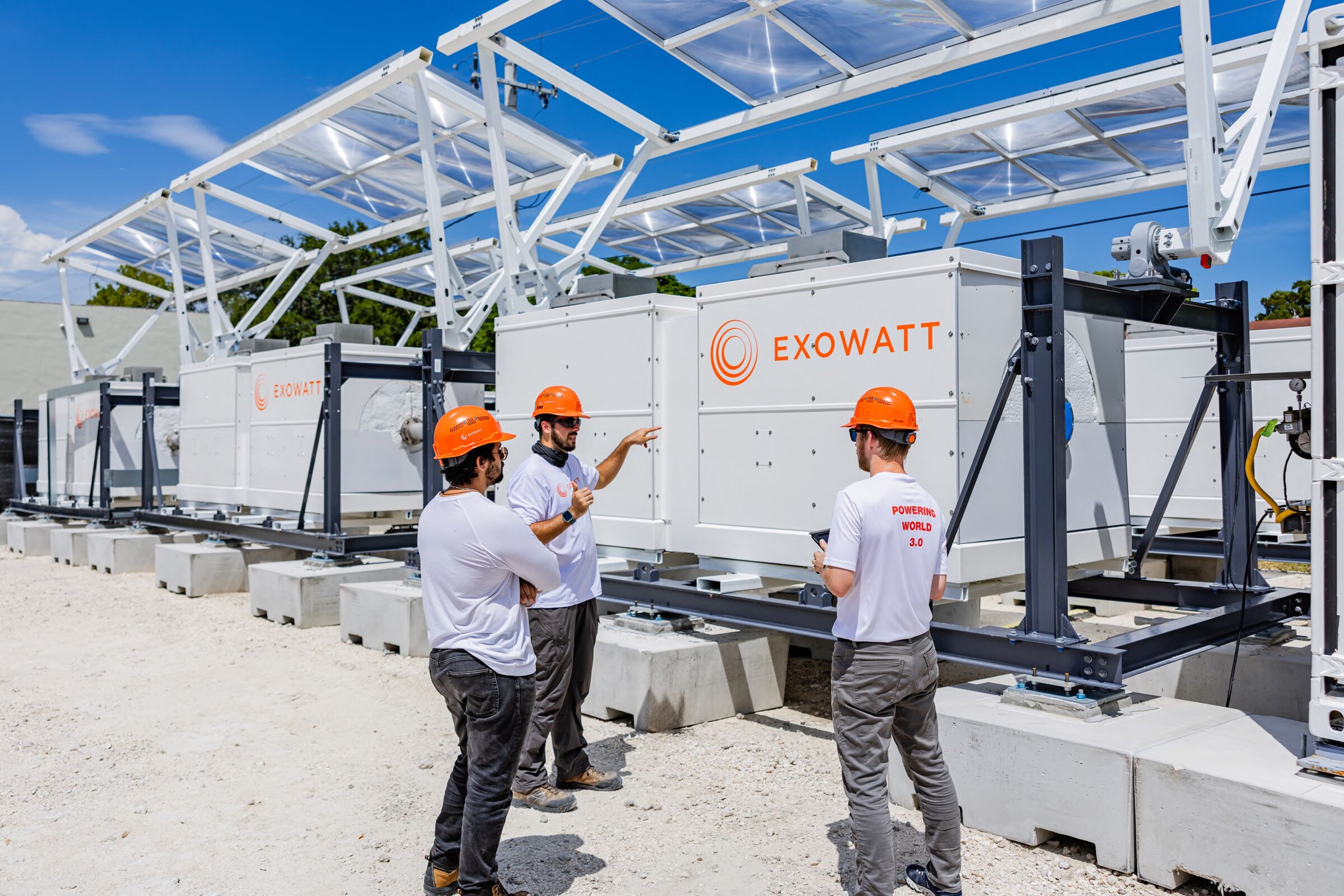 Exowatt team in front of a module installation